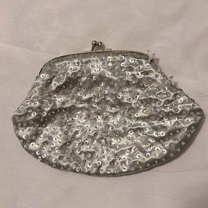 Silver beaded clutch